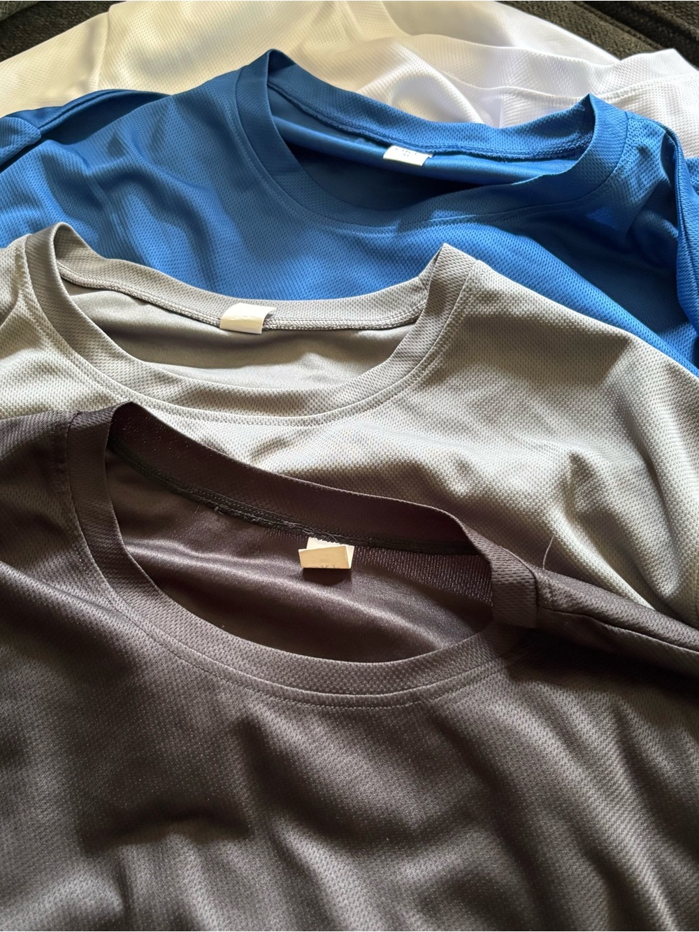 Men's Performance Crew Neck Shirt - Blue, Gray, Black, and white.